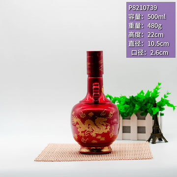 匠心独运，品质之选——定制金属红喷涂瓶与高白料玻璃酒瓶的完美融合